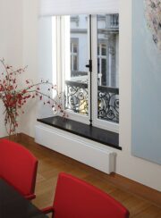 Low Jaga Linea Plus Energy Efficient Radiator Finished in White under large window