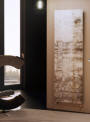 Cordivari Material 1 Designer Radiator Original Art Concrete on brown walls and lampstand.
