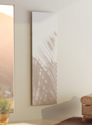 Ethereal Frame Designer Art Radiator by Cordivari in pale living space and brown easy chair