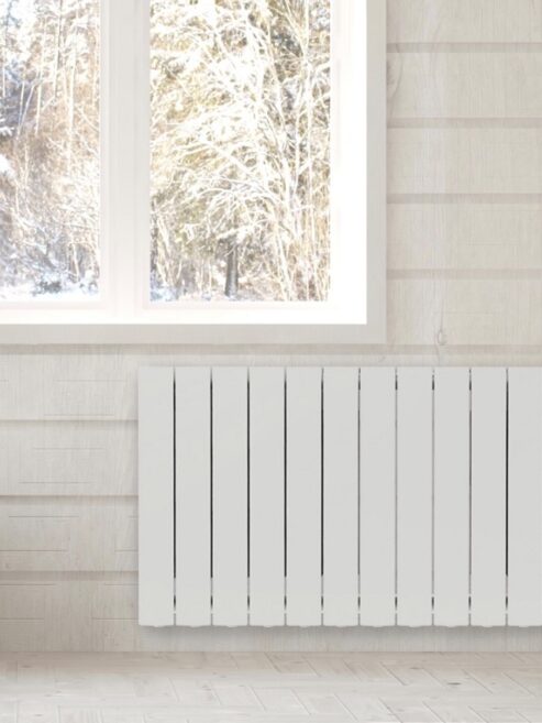 Decoral Electric radiator in Pure White under window