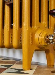 Mercury 4 Column radiator foot section in Paint & Paper Muga on tiled floor