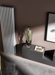 Arianna Vertical Designer Radiator on brown wall in living room