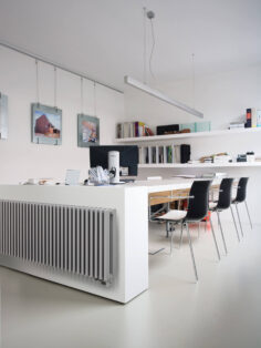 Zana Radiator in RAL 9016 shown in kitchen
