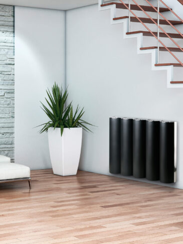 Tonda horizontal black contemporary aluminium radiator in Living room