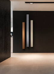 Multi coloured offset Beams Mono radiators hallway