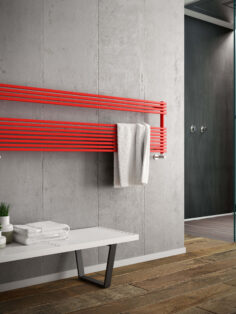 Katia Wide Towel Rail shown in bathroom