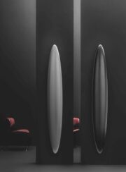 Matt Black Surf Electric surfboard radiator shown in Front room