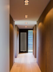 Arche Vertical raditor in hallway in S600 standard white