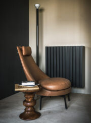 Low Soho Aluminium Radiator finished in grey with leather chair