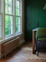 Low Mercury 4 Column cast iron radiator under window