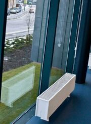 Mini Fixed Feet in White in front of glazing