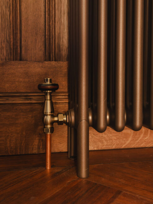 Traditional TRV radiator valve on bronze traditional radiator