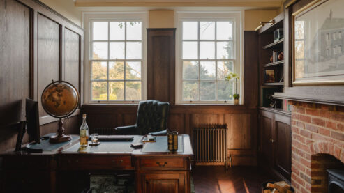 Traditional radiator shown in office in Victorian home