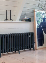Spartan 4 Column cast iron radiator in bedroom finished in Black Iron