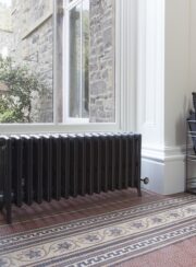 Spartan 6 Column Cast Iron Radiator in astral dark grey in living space