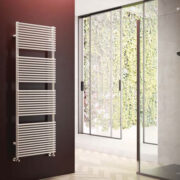 Cordivari Lucy Towel Rail in Stone Grey finish on dark brown bathroom wall