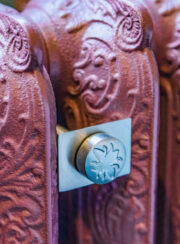 Whitworth Retaining Stay on Red Rococo Cast Iron radiator