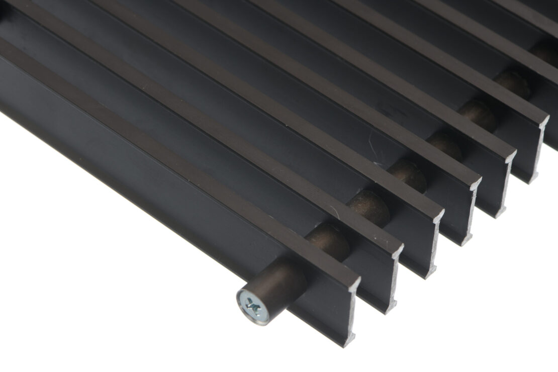 Trench Heating Roll Up Grille in Brown Anodized Aluminum Detail