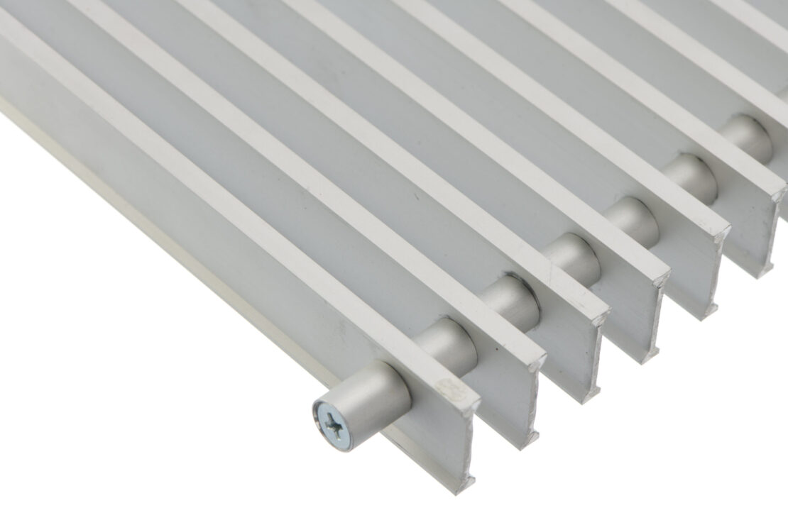 Trench Heating Roll Up Grille in Natural Aluminum Detail