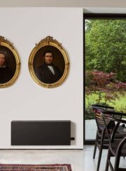 Strada Radiator in Matt black Air source heat pump ground source heat pump Jaga on white wall and below pictures