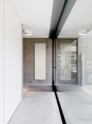 Vasco Square Tubes Vertical Designer Radiator finished in White in long Corridor