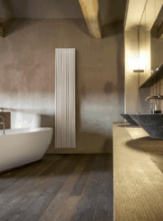 Carre Vertical Designer Radiator by Vasco finished in white in large sand coloured bathroom