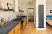 Duoline Vertical Aluminum Contemporary Radiator in Gun Metal Grey finish in kitchen