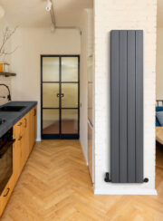 Duoline Vertical Aluminum Contemporary Radiator in Gun Metal Grey finish in kitchen