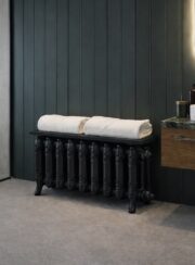 Georges Traditional Electric Radiator in Black with shelf system in bathroom with towels