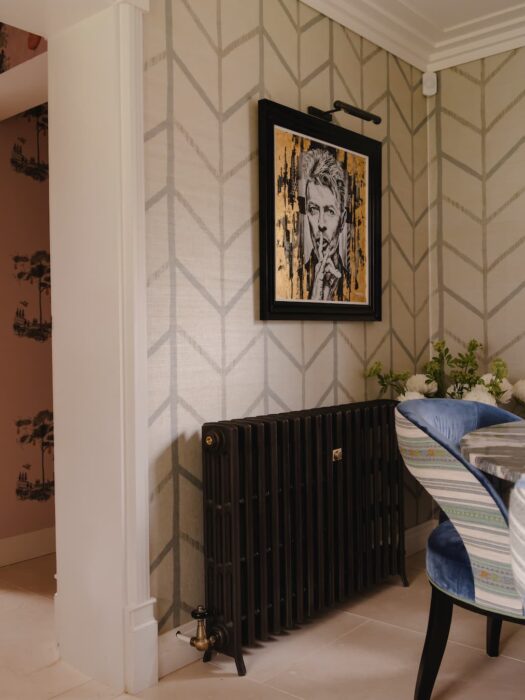 Traditional column radiators in bronze in dining room
